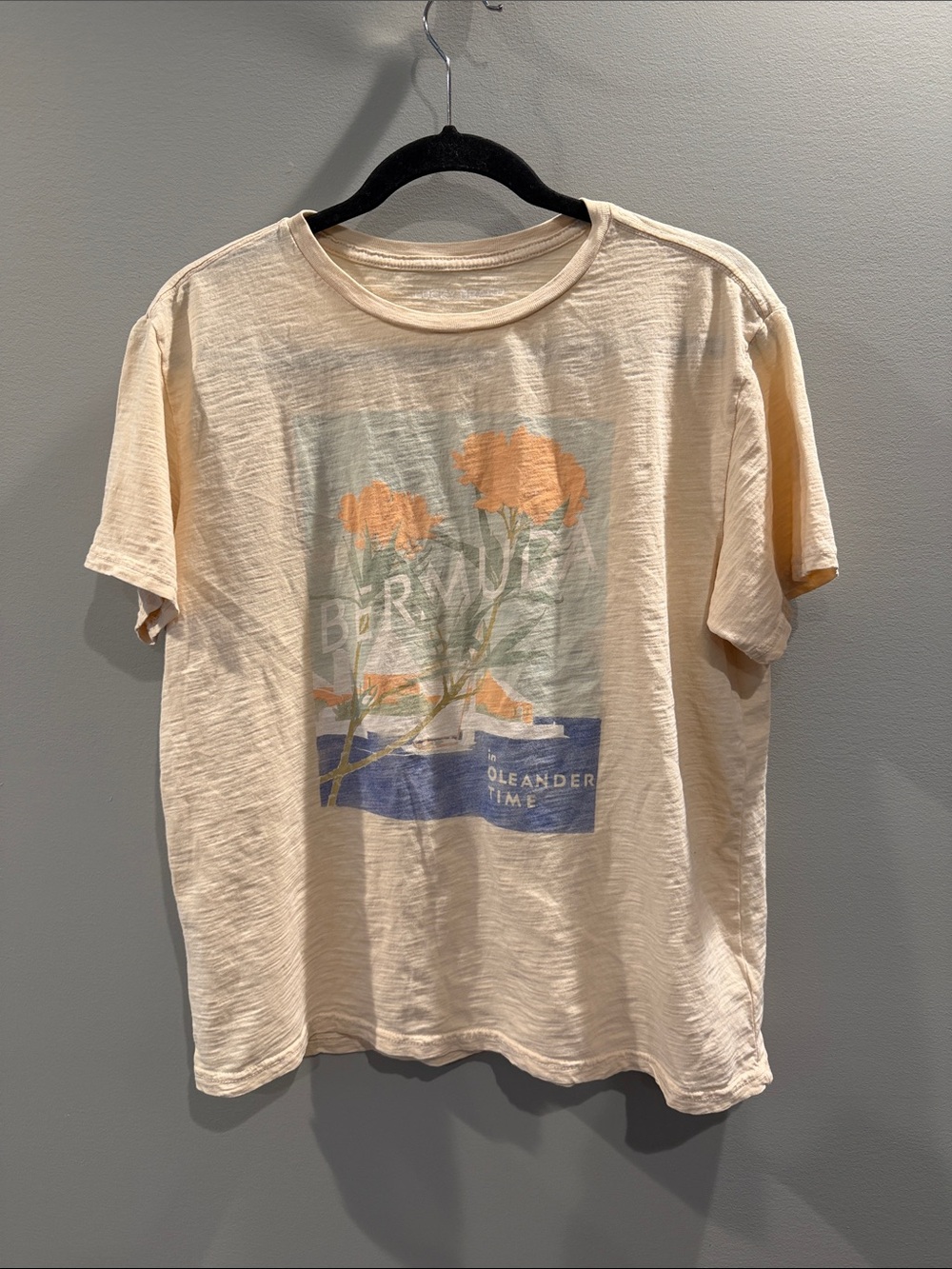 Lucky Brand Light Peach Graphic Tee with Orange Floral and Blue Accents